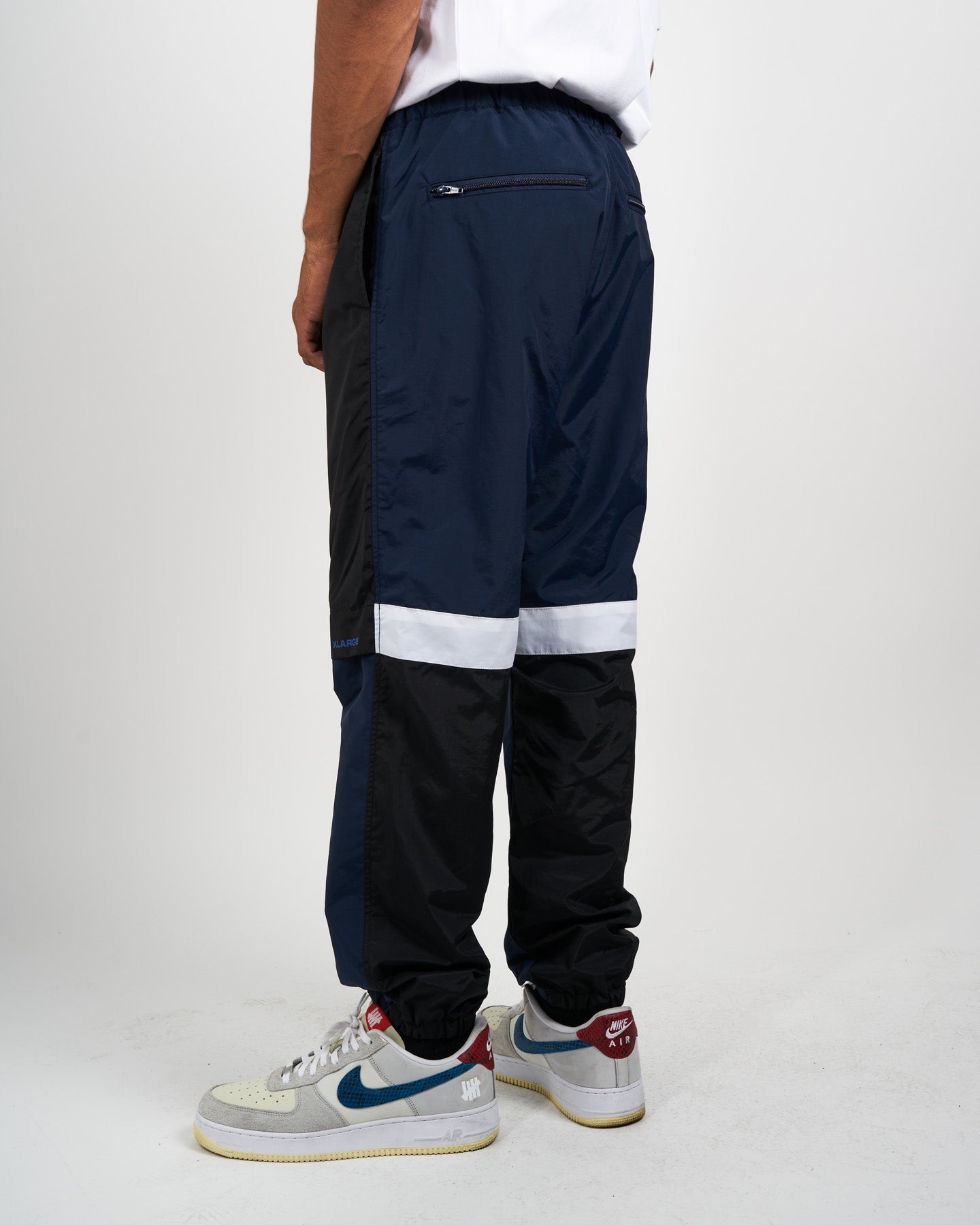 WARM UP NYLON PANTS