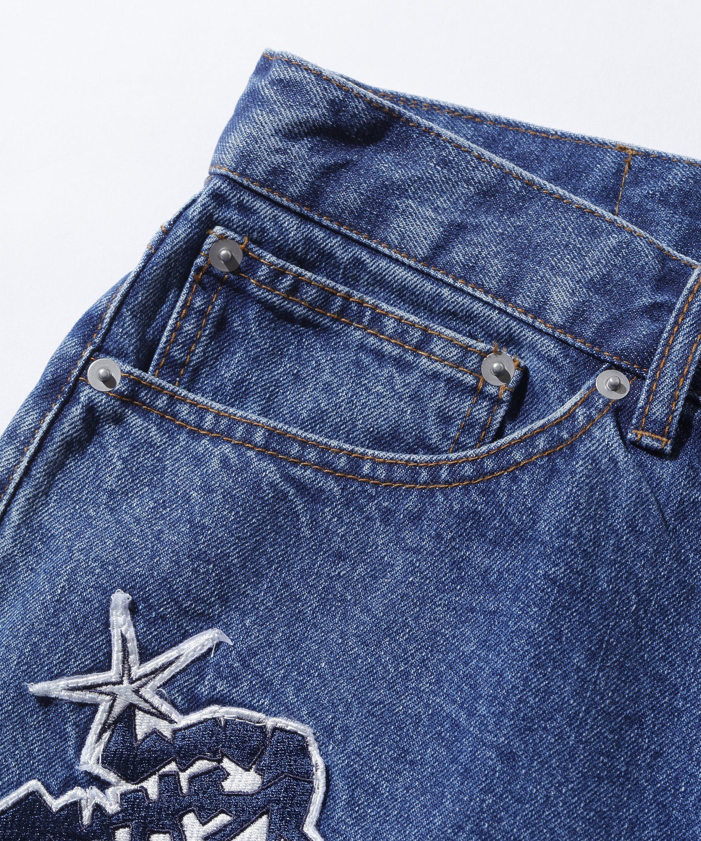 PATCHED DENIM PANTS