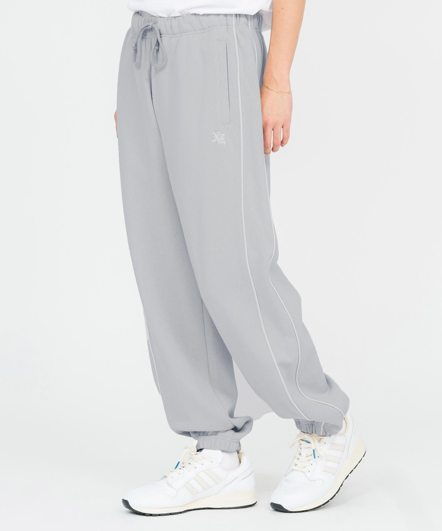 EMBROIDERED LOGO PIPING SWEAT PANTS